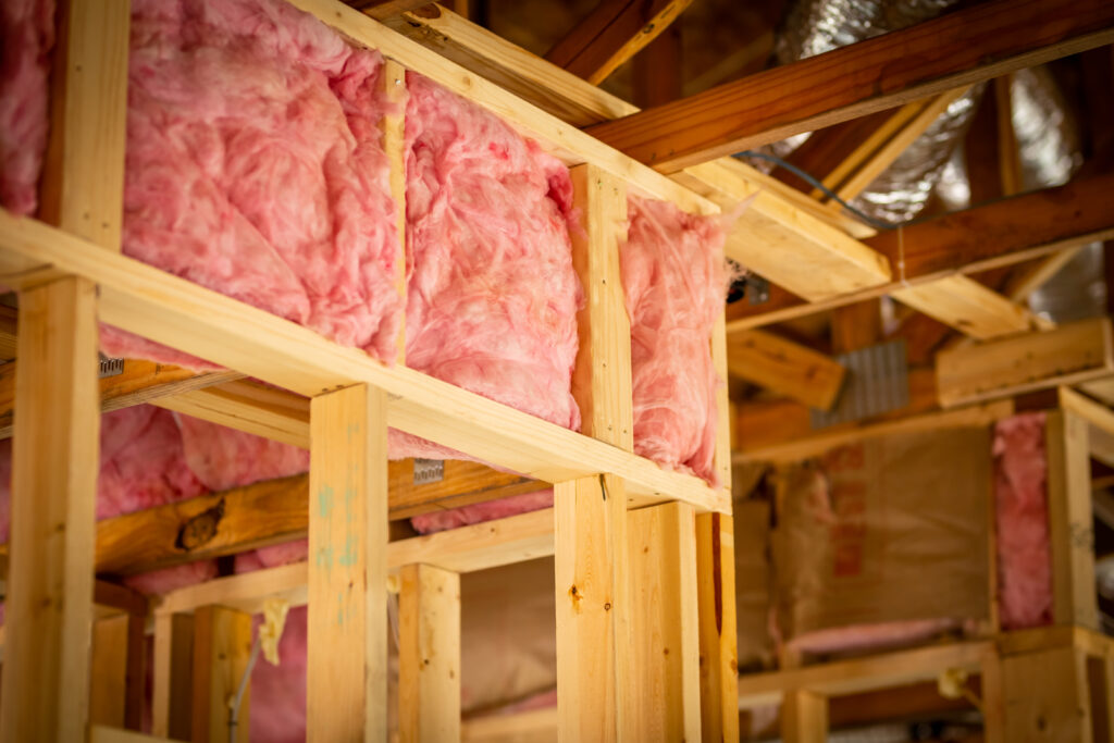 fiberglass batt insulation in the wall of a new home